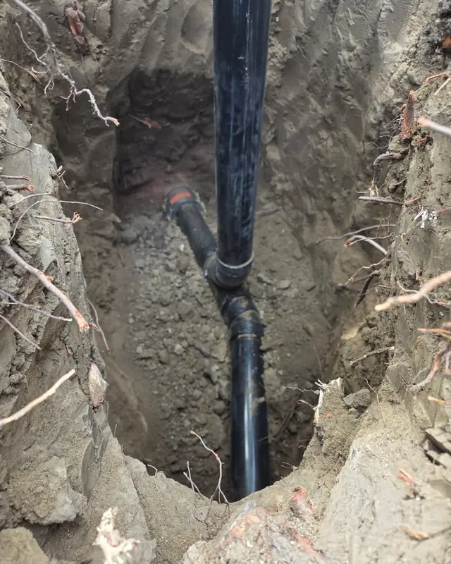 Excavation around a sewer line on a Jeff's Plumbing job